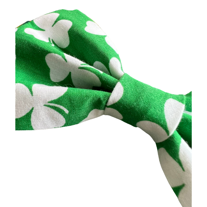 White shamrock on green fabric dog bowtie